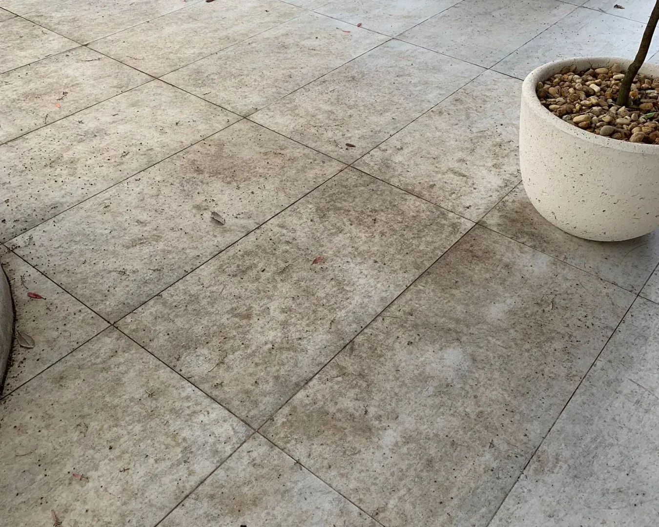Pool deck before tile and grout cleaning