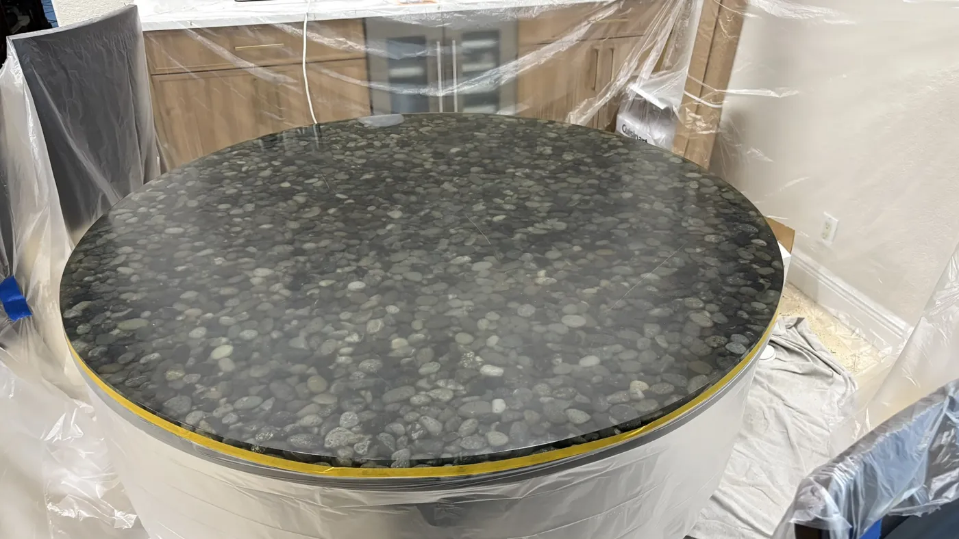 River stone tabletop before countertop restoration